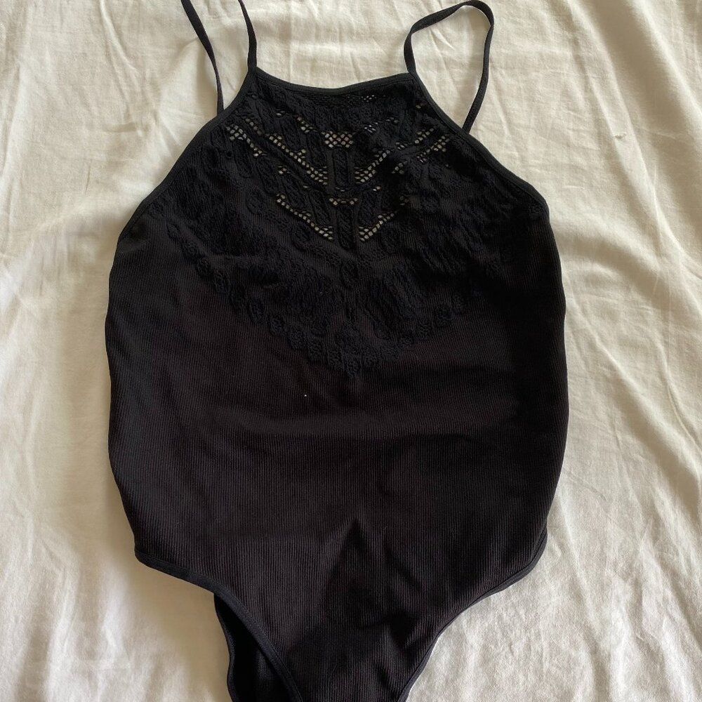 Free People cut out body suit Size: M/L